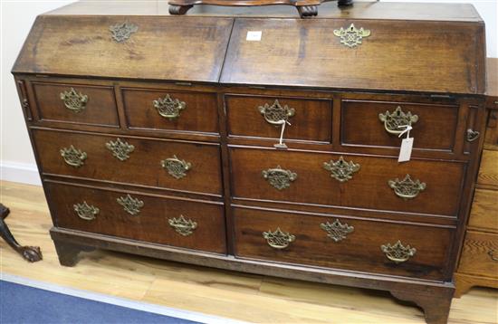 An 18th century style oak double bureau, W.143cm